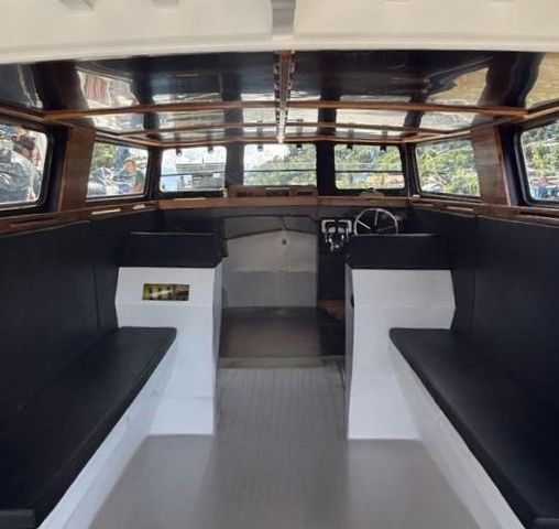 Nyanya Hujang cabin with bench seating on both sides